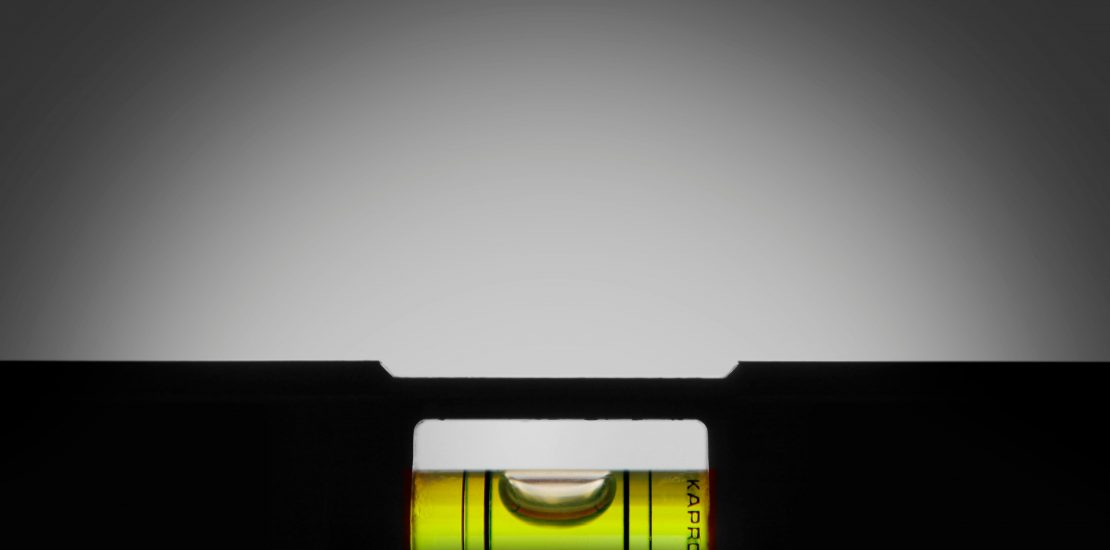 an image of a level with the bubble perfectly balanced in the centre