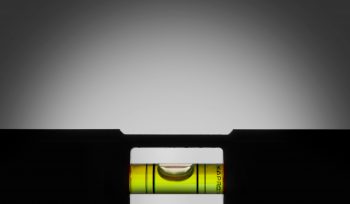 an image of a level with the bubble perfectly balanced in the centre